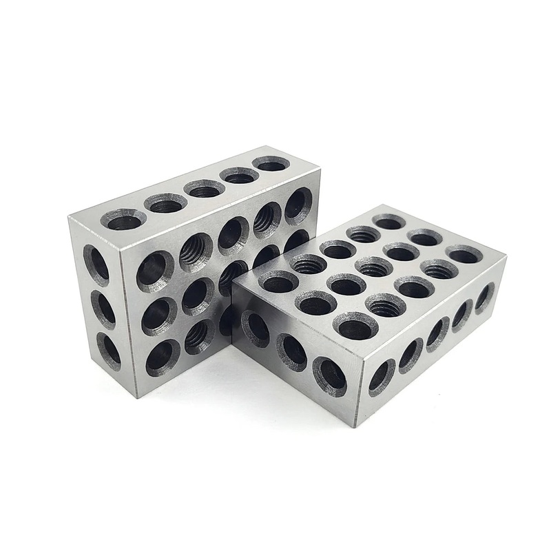 MHC 630-4012, 25 x 50 x 75mm Blocks Description : Block Set with 23 holes Accuracy .005mm